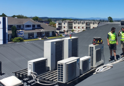 Commercial air conditioning system being serviced